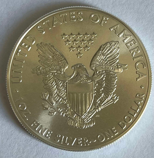 Random Year American Silver Eagle 1 oz Silver Coin in Capsule (note: may contain milk spots and toning)