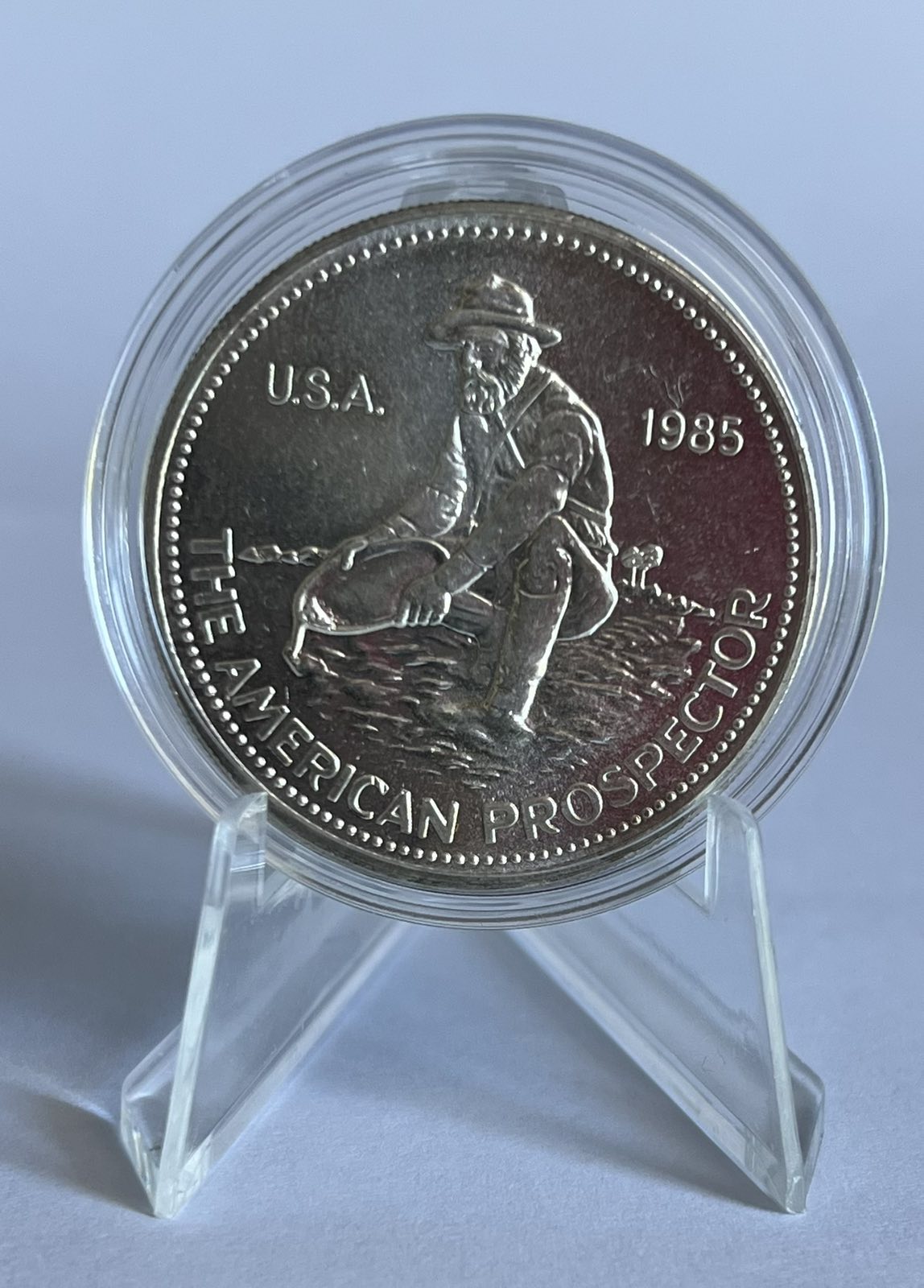 1 Ounce - Engelhard Mint The American Prospector (note: contains contact marks and toning)