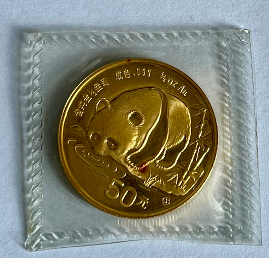 1987-S China 1/2 oz Gold Panda BU in Mint-Sealed Packaging (note: contains slight toning)