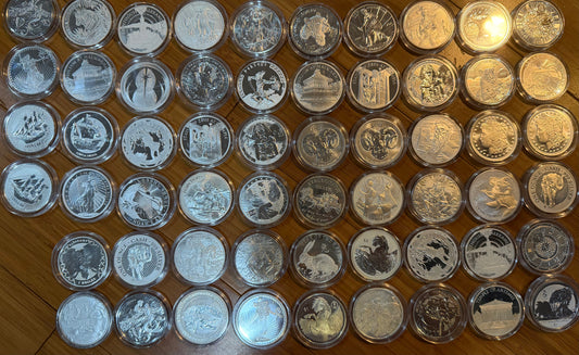 Assorted 1 oz Silver Coins (note: random design; cannot choose design)