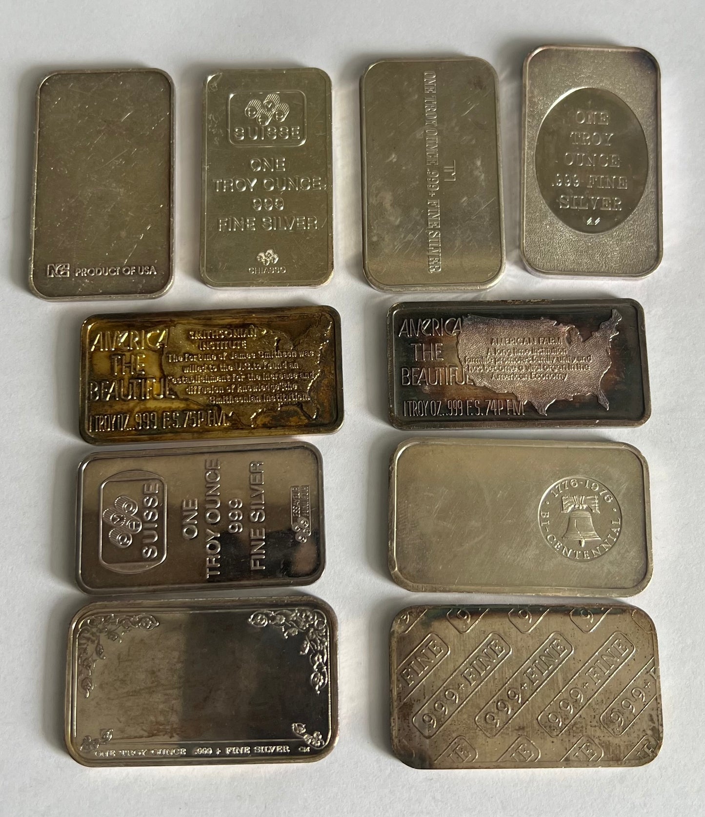 1 oz Circulated Silver Bar - Random Design (note: contains toning and marks, and with no capsule; other designs not shown on pic)