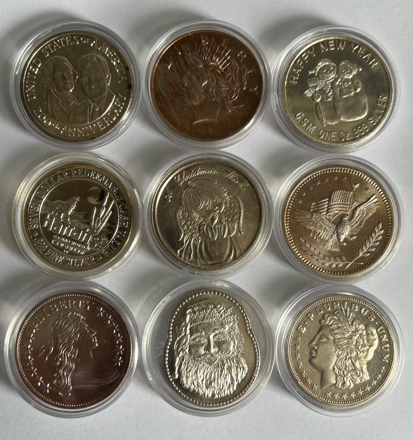 1 oz Circulated Silver Art Round - Random Design in Capsule (note: contains contact marks and toning, other designs not shown on pic)
