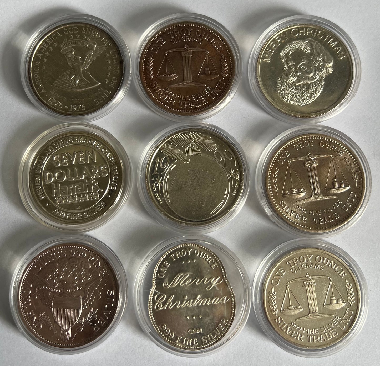 1 oz Circulated Silver Art Round - Random Design in Capsule (note: contains contact marks and toning, other designs not shown on pic)