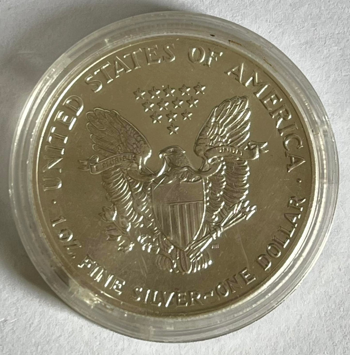 Random Year 1 oz American Silver Eagle may contain milk spots, toning, scratches, etc)