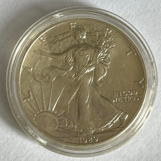 Random Year 1 oz American Silver Eagle may contain milk spots, toning, scratches, etc)