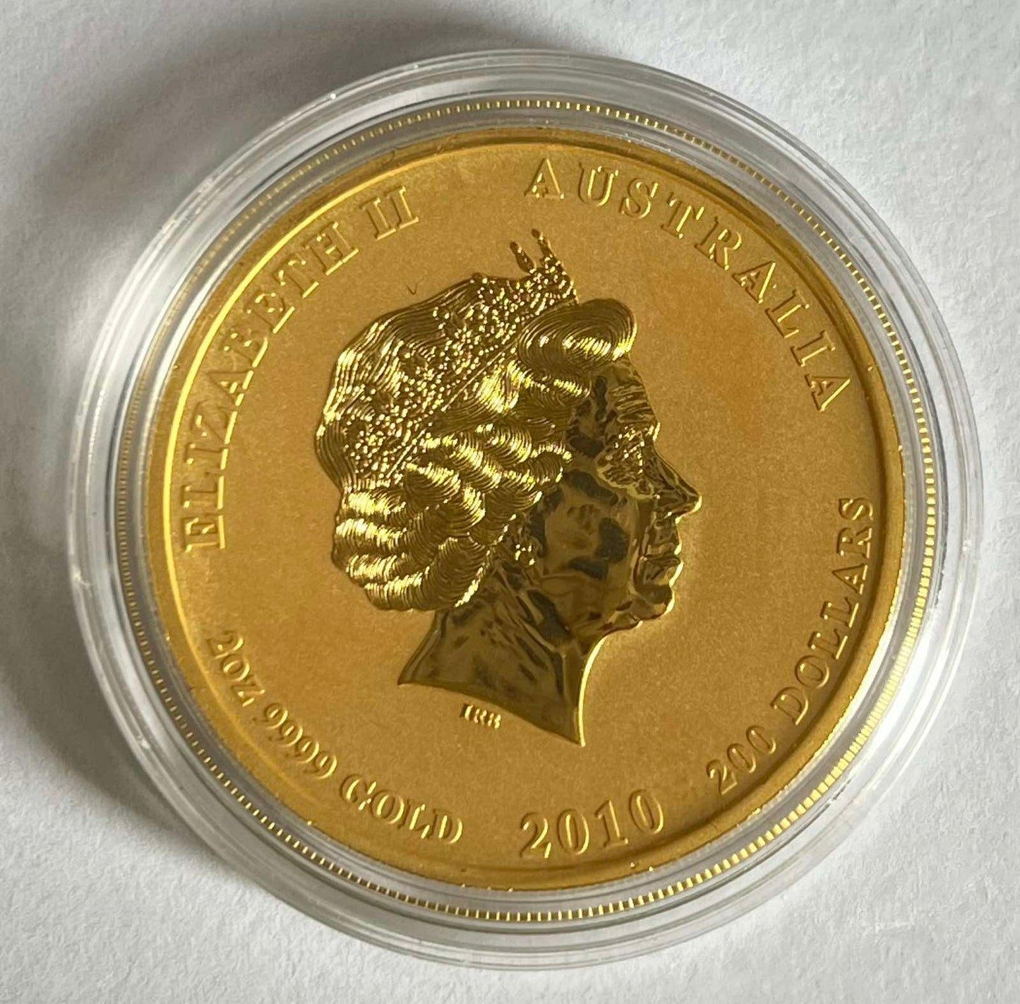 2010 Australia Lunar Tiger 2 oz Gold Coin in Capsule (Note: Has dent. See photos.)