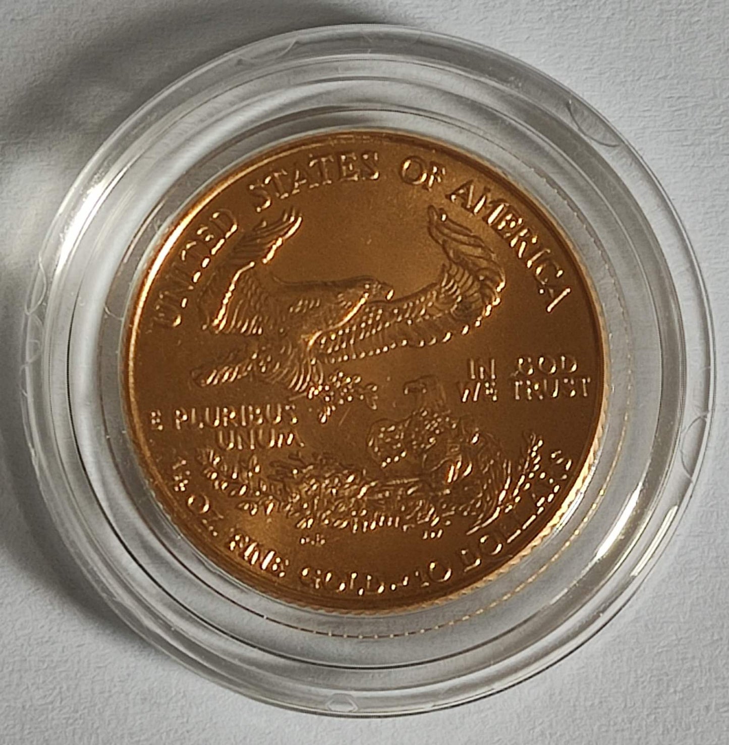 Random Year American Gold Eagle 1/4 oz BU in Capsule