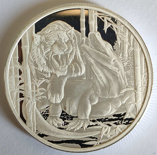 2022 Niue Apex Predators: Komodo Dragon v. Tiger 1 oz Silver Coin        BU in Capsule