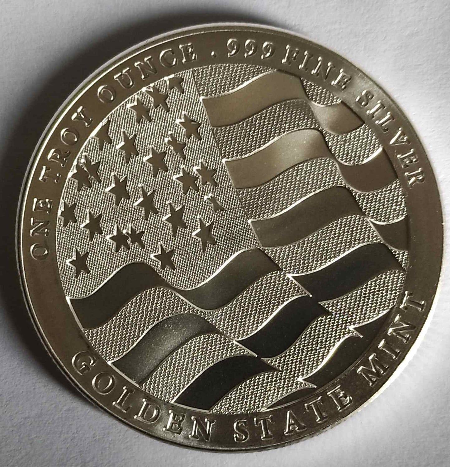 Golden State Mint Eagle Round in Capsule (note: may contain minor contact marks)