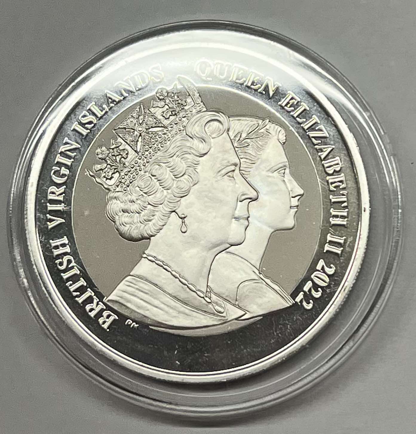 2022 BVI Life of Queen Elizabeth 1 oz Silver Coin in Capsule (note: may contain minor contact marks)