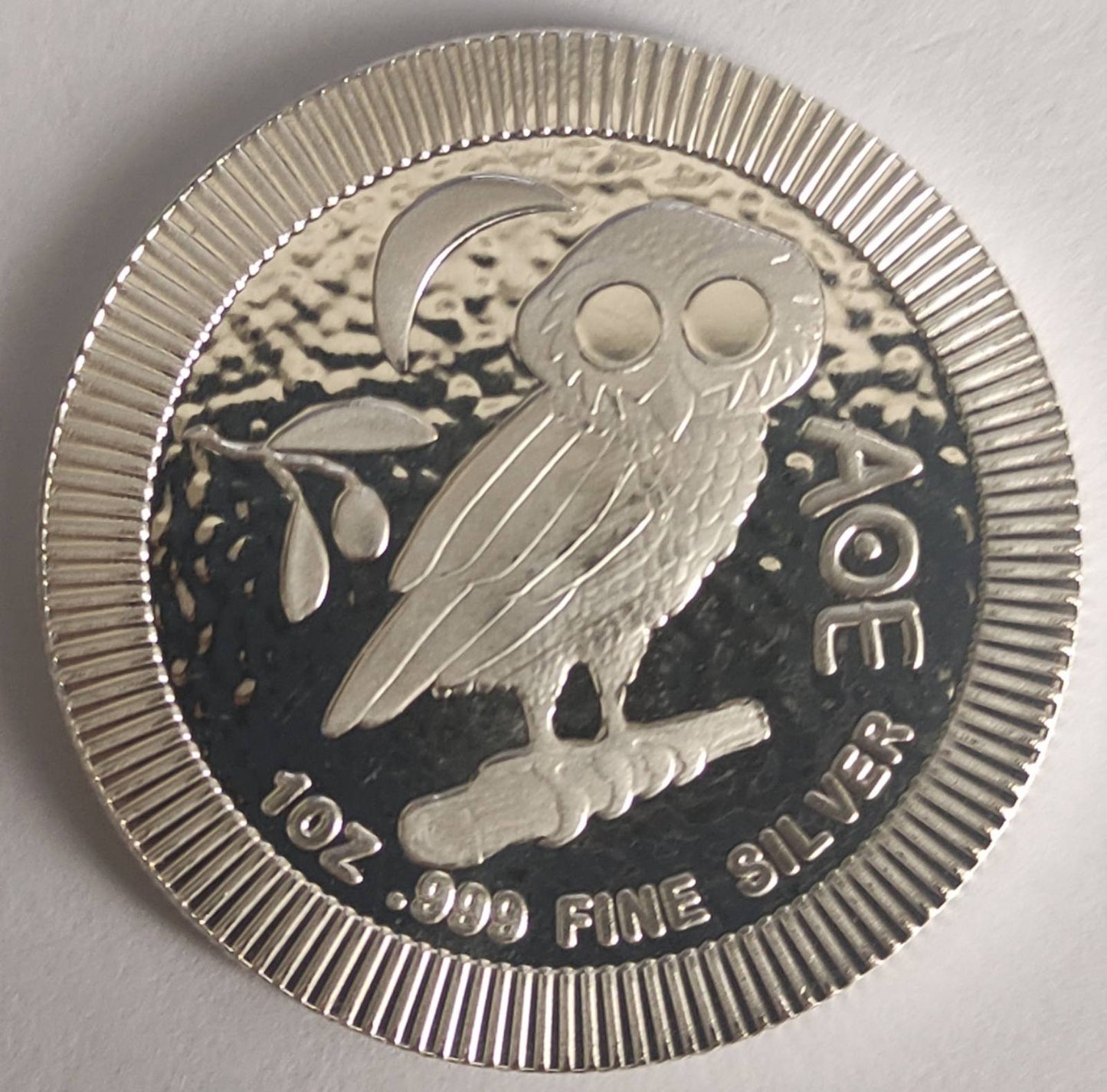 2022 Niue Athenian Owl 1 oz Stackable Coin in Capsule (note: may contain minor contact marks)